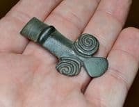 A large zoomorphic bronze terminal from a huge Anglo Saxon bronze cruciform brooch, Norfolk.