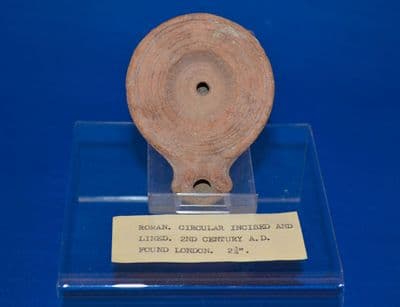 A lovely little Roman terracotta oil lamp with makers mark, excavated early 1920's in London.SOLD