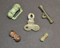 A nice group of 5 x assorted Iron Age /  Celtic bronze Toggles & mounts, Cambridgeshire