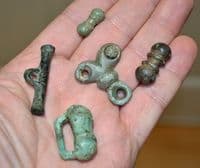 A nice group of 5 x assorted Iron Age /  Celtic bronze Toggles & mounts, Cambridgeshire