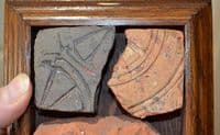 A nice group of Medieval decorative floor tile segments in a vintage frame, Staffordshire. SOLD