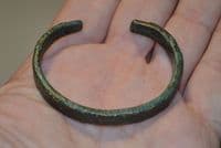 A nice, robust and wearable Celtic bronze open ended bangle.