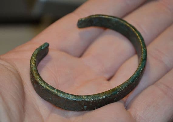 A nice, robust and wearable Celtic bronze open ended bangle.