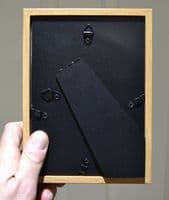 A nicely framed fragment of painted cartonnage from an Ancient Egyptian anthropoid sarcophagus. SOLD