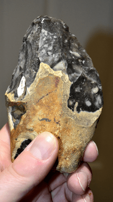 A nicely worked Upper Paleolithic (Mousterian / Neanderthal) flint hand axe found near London. SOLD