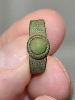 A pleasant post-Medieval Ladies bronze finger ring with inset green stone, Yorkshire. SOLD