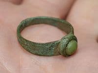 A pleasant post-Medieval Ladies bronze finger ring with inset green stone, Yorkshire. SOLD