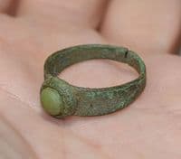 A pleasant post-Medieval Ladies bronze finger ring with inset green stone, Yorkshire. SOLD