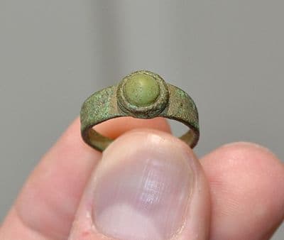 A pleasant post-Medieval Ladies bronze finger ring with inset green stone, Yorkshire. SOLD