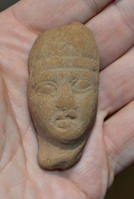 A pleasant Ptolemaic period Ancient Egyptian terracotta bust from a votive figurine. SOLD