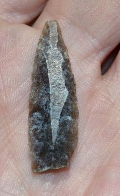A pleasantly worked Neolithic flint uni-facial Laurel leaf arrow head, Normandy, France. SOLD