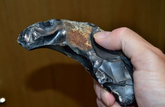 A Rare & Early Lower Paleolithic flint hand pick, Happisburgh, Norfolk. SOLD