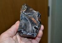 A rare, early Lower Paleolithic flint Proto-Hand Axe / Chopper, Pakefield, Suffolk. SOLD
