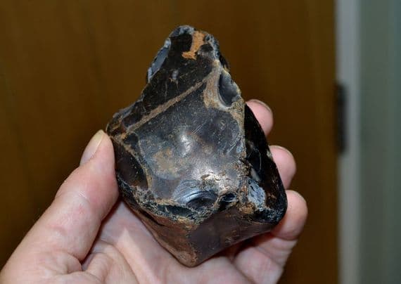 A rare, early Lower Paleolithic flint Proto-Hand Axe / Chopper, Pakefield, Suffolk. SOLD
