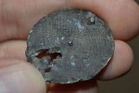 A rare late Anglo Saxon / Viking lead-pewter disc brooch featuring a raised dot design, found in River Thames, London. SOLD