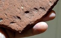 A rare segment of Roman terracotta roof tile featuring a childs fingerprints (K2)
