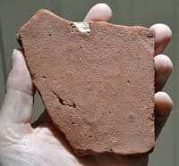 A rare segment of Roman terracotta roof tile featuring a childs fingerprints (K2)