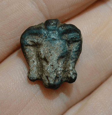 A scarce and detailed Ancient Egyptian turquoise faience amulet of Khnum (Ram headed God) SOLD