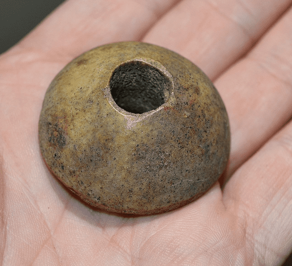 A scarce and excellent, Anglo Saxon carved and polished Bone Spindle Whorl,Thetford, Norfolk. SOLD