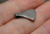 A scarce and excellent Celtic silver Axe pendant with punched decoration on either side. SOLD