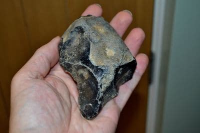 A scarce and excellent Lower Paleolithic pointed unifacial flint hand axe, Hoxne, Suffolk. SOLD