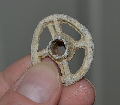A scarce and unusual lead wheel from a Roman childs pull along toy  chariot, Nottinghamshire. SOLD
