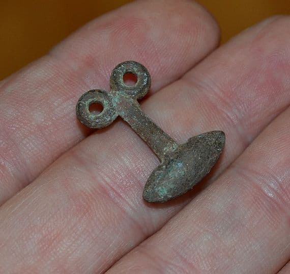 A scarce and unusual Roman bronze clothing toggle fastener, Essex. SOLD