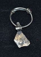 A scarce and unusual Viking silver axe pendant on its original suspension loop, Eastern Europe. SOLD