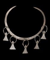 A scarce and unusual Viking silver axe pendant on its original suspension loop, Eastern Europe. SOLD