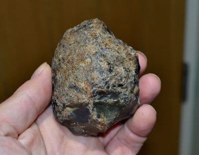 A scarce Early Lower Paleolithic Flint hammer stone, Happisburgh, Norfolk. SOLD