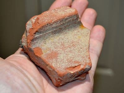A segment of Roman pottery roof tile (Tegula) found in the River Thames, London (1) SOLD