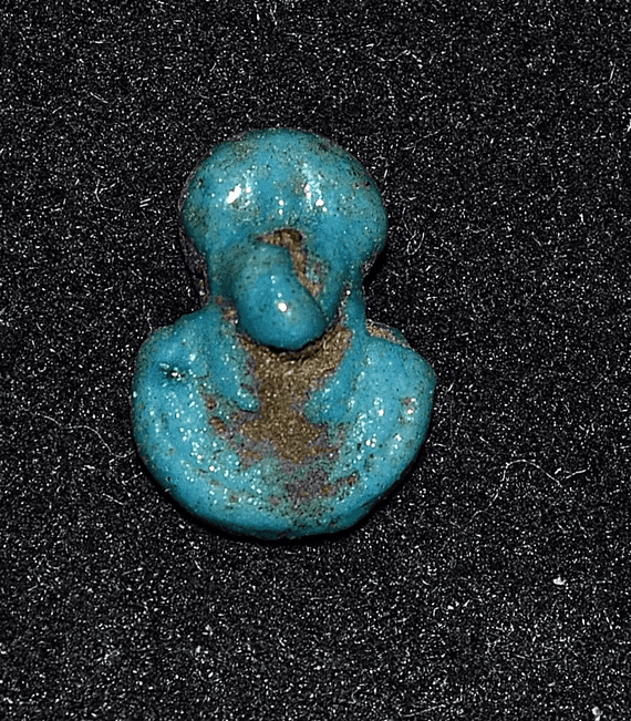 A small Ancient Egyptian turquoise glazed faience amulet of Sekhmet (Lion headed Goddess) SOLD