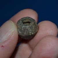 A small but attractive Early Medieval lead Spindle Whorl from London. SOLD
