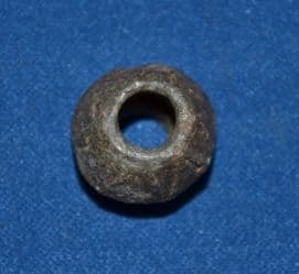 A small but attractive Early Medieval lead Spindle Whorl from London. SOLD