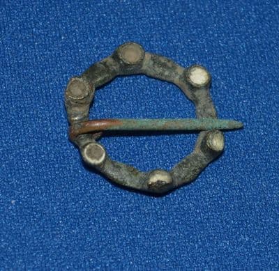 A small but attractive Medieval Annualar Brooch with some inlay remaining, complete with pin. SOLD