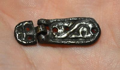 A small but very ornate Anglo Saxon silvered bronze hinged strapend from Lincoln. SOLD