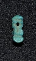 A small stylised Ancient Egyptian Faience amulet of Ptah Sokar (Dwarf God) SOLD