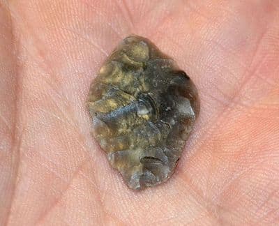 A superb and finely worked semi-translucent Neolithic flint lozenge shaped arrowhead from Suffolk. SOLD
