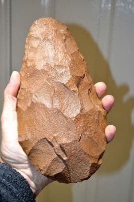 A truly colossal and superb quality Paleolithic Acheulian Handaxe from Zaggora, N.Africa SOLD