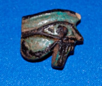 A very large Ancient Egyptian Bi-chrome glazed Eye of Horus amulet. SOLD