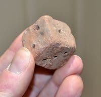 A very large and rare Roman terracotta gaming dice, North Yorkshire. SOLD