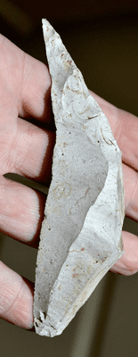 A very nice Upper Palaeolithic, Magdalenian period flint hand sickle found near Paris, France in 1972. SOLD