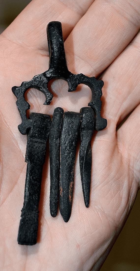 A very rare, complete and excellent Viking womans bronze openwork 