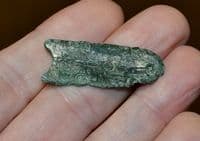 A Viking period silvered bronze strap end, Northern Europe. SOLD