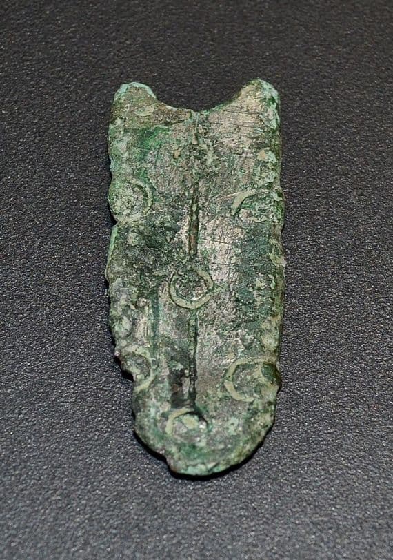 A Viking period silvered bronze strap end, Northern Europe. SOLD