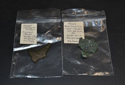 An Anglo Saxon partial engraved bronze mount & Small long brooch headplate, Norfolk.