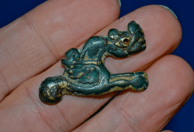 An attractive Ancient Chinese decorative bronze mount in the form of a leaping Dragon. SOLD