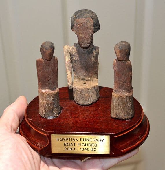 An attractively mounted group of 3 x Ancient Egyptian wooden funerary boatmen, Thebes. SOLD