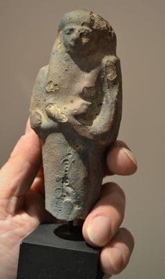 An attractively mounted major portion from a huge and impressive Ancient Egyptian faience Ushabti, 20th Dynasty. SOLD