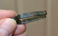 An excellent and still functional pair of Medieval bronze tweezers with punched decoration from Norfolk. SOLD